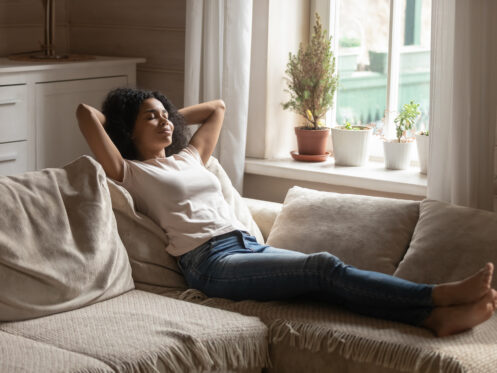A young lady breathing fresh air in her South Bay home